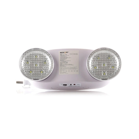 Lámpara de emergencia LED de 5.4W instalada en pared de zona común, con botón de prueba y batería recargable